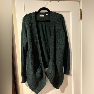 Sleeping on Snow green sweater